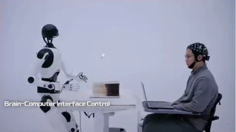 Mind-Controlled Humanoid Robot Turns Pages, No Brain Surgery Required