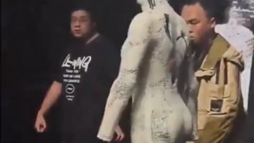 XPeng's Handless Robot Struts a Surreal Catwalk