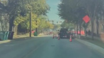 Tesla FSD 14 Backs Down From Oncoming Bus