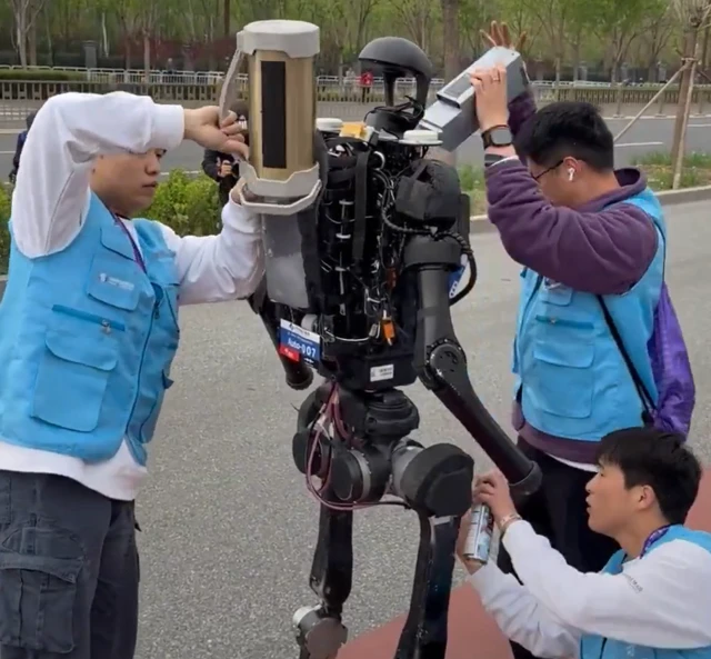 Humanoid's Marathon Pit Stop: Ice, Lube, and a Battery Swap