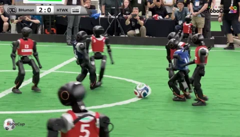 RoboCup 2026: The First 11-vs-11 Humanoid Robot Soccer Match