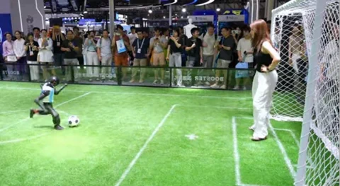 Booster Robotics' Humanoid Shoots, Scores at WAIC 2026